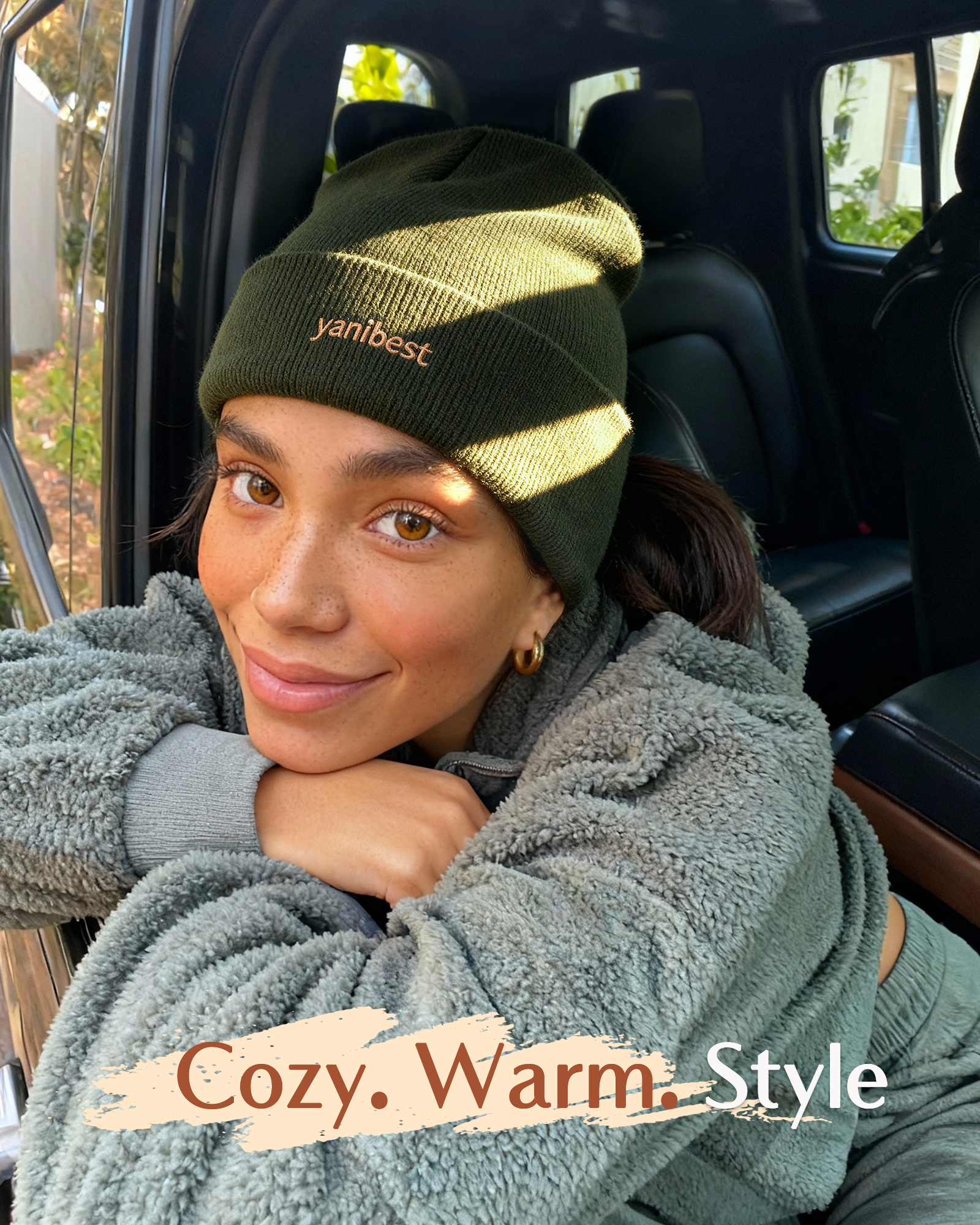 Model wearing YANIBEST Olive Green Knit Beanie with 100% Mulberry Silk Lining for Hair Care, prevents frizz and retains moisture, cozy and stylish winter hat lifestyle shot