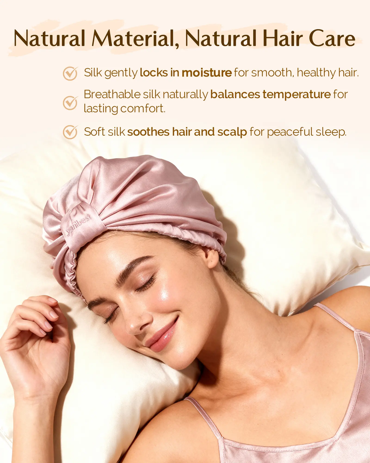 Woman lounging comfortably at home wearing a pink mulberry silk sleep bonnet turban