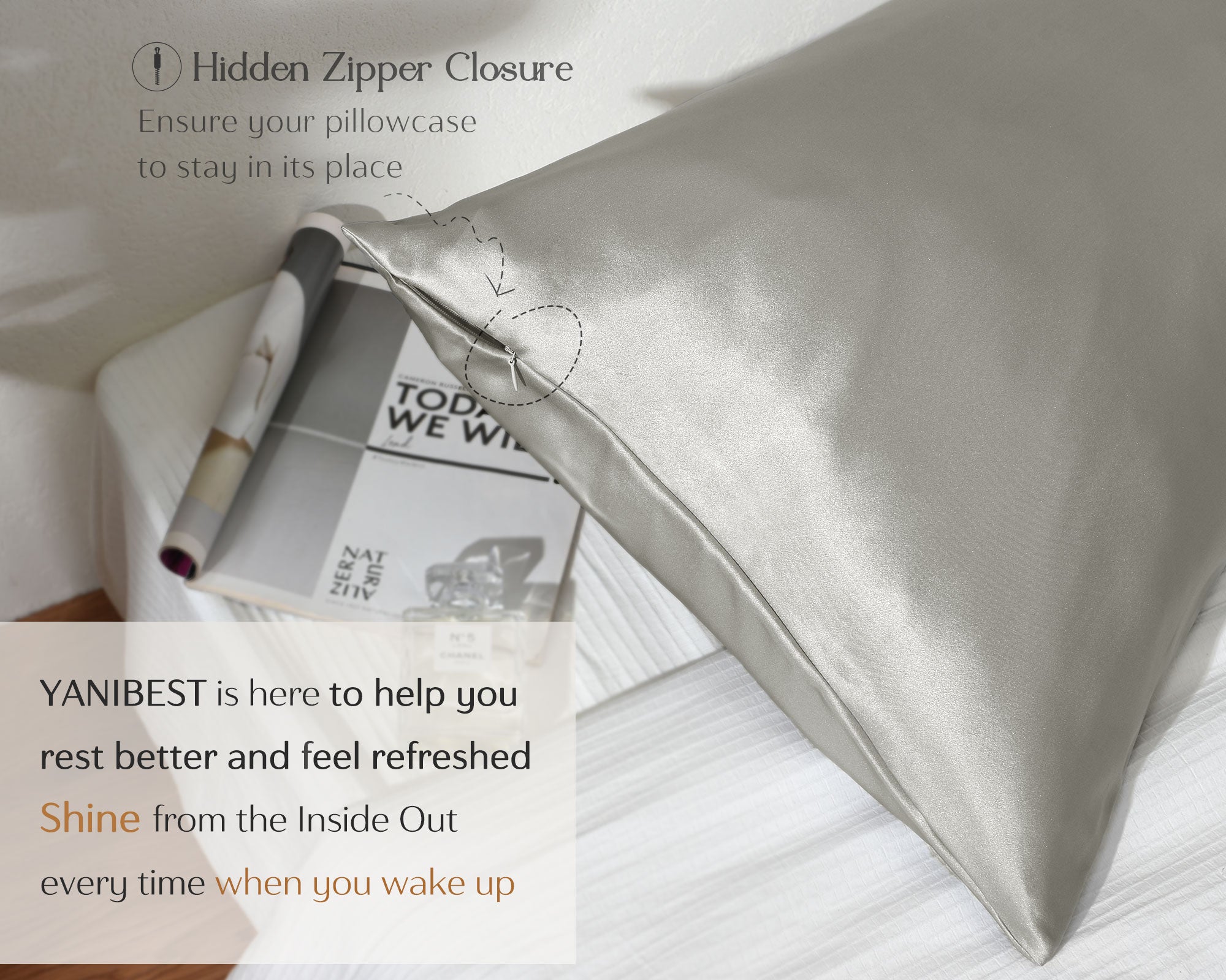 Shiny silver mulberry silk pillowcase with hidden zipper closure on a white bed