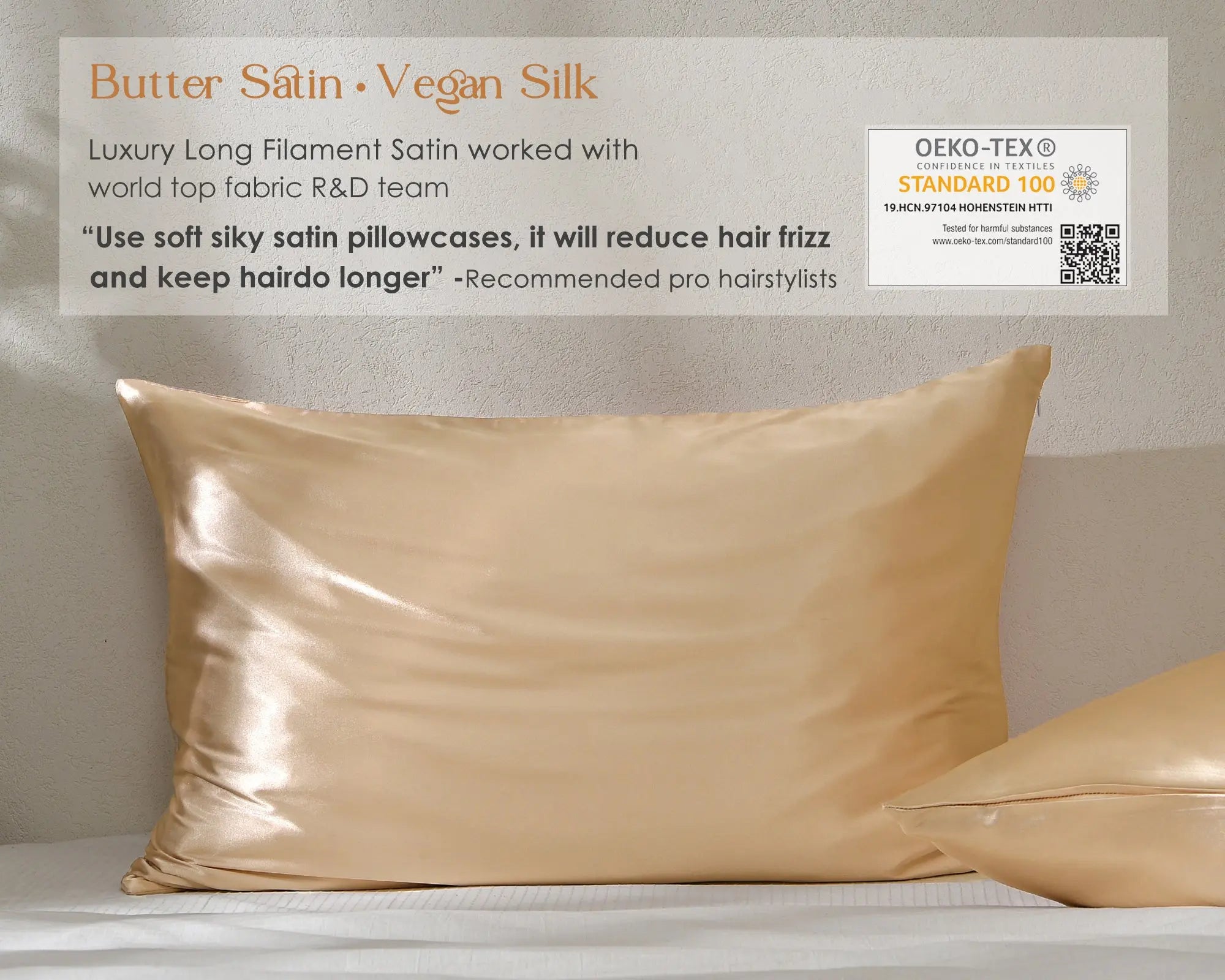 Golden champagne satin pillowcases set on white bedding against a textured wall