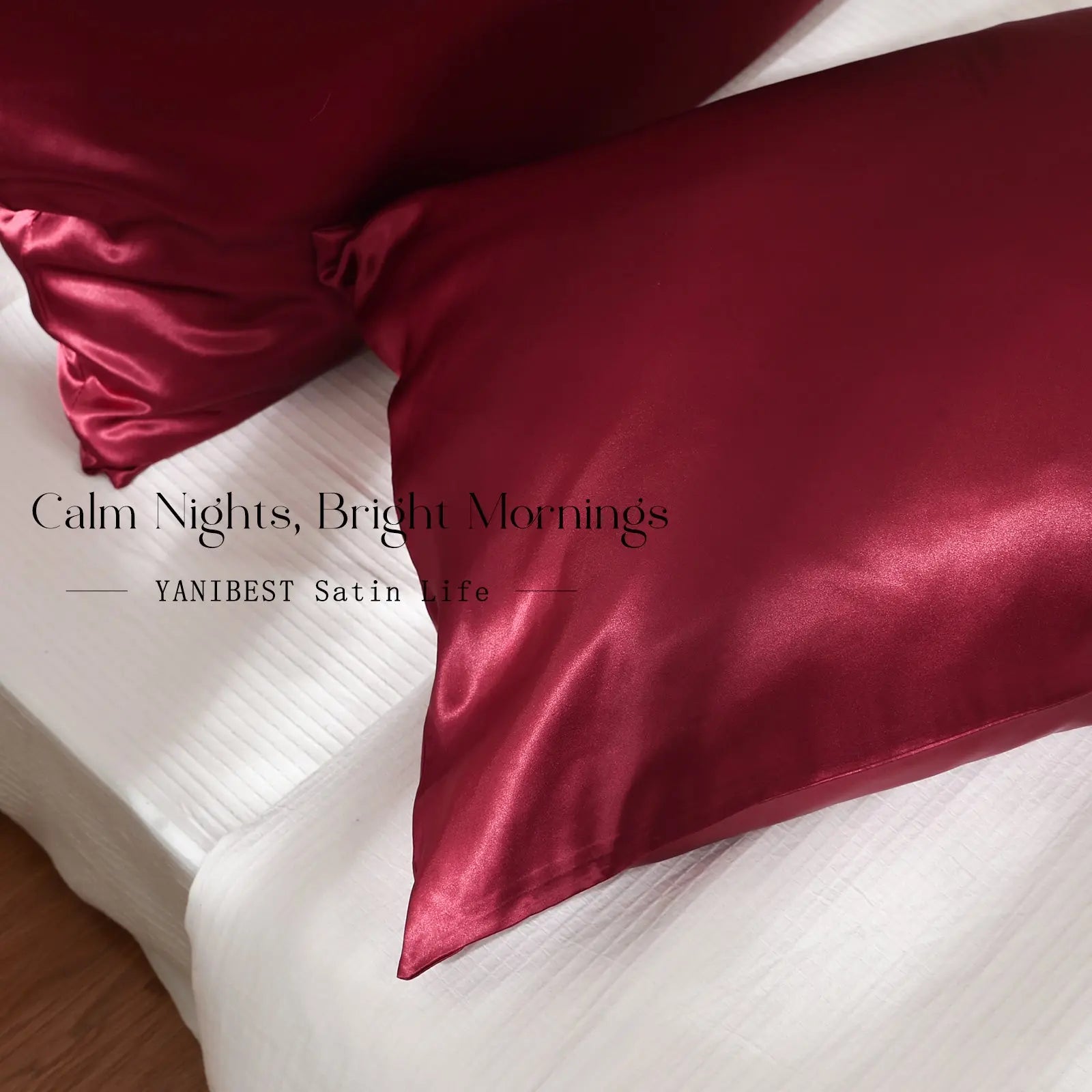 Luxury red satin pillowcases set on a bed with smooth, shiny finish for hair and skin care.