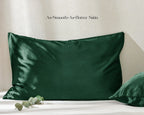 Olive green satin pillowcases set on bed with soft sheen, luxurious hair care bedding.