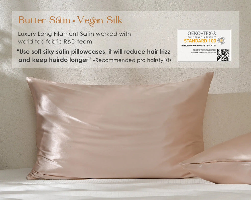 Rose gold satin pillowcases on bed, luxury vegan silk, reduces hair frizz