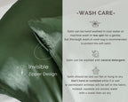 Sage green satin pillowcase with invisible zipper, wash care instructions beside it