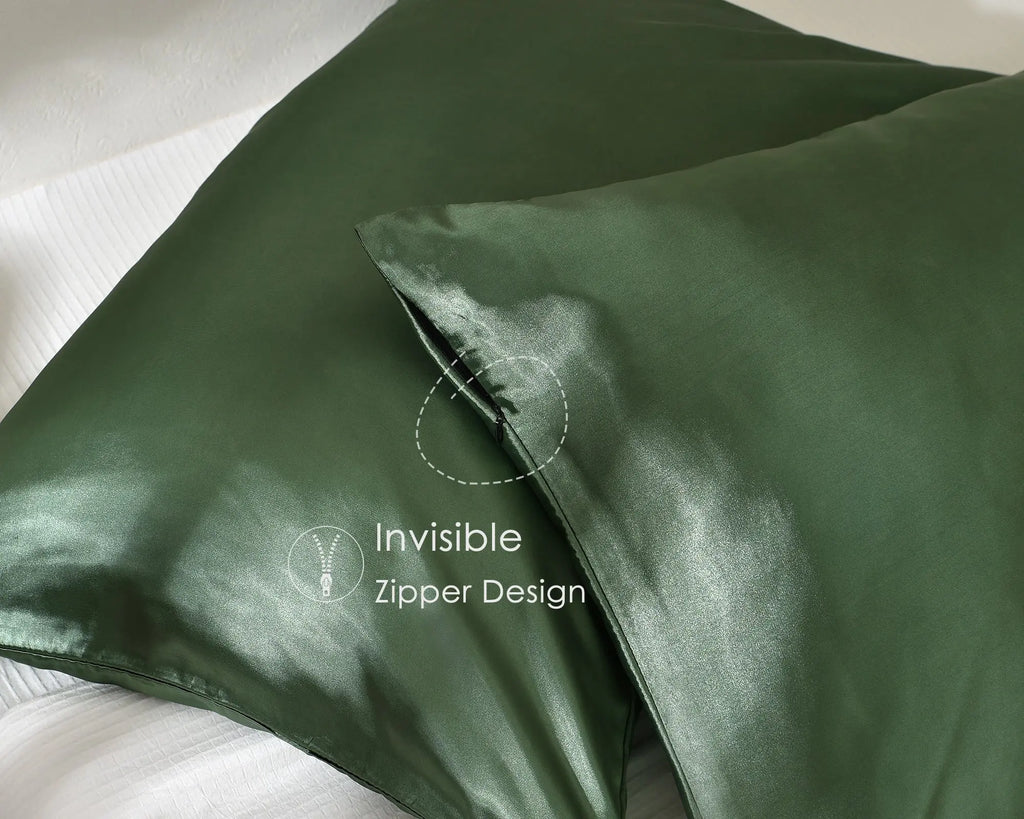 Sage green satin pillowcases with invisible zipper on white bedding