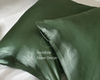 Sage green satin pillowcases with invisible zipper on white bedding