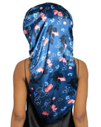 Long satin bonnet with blue and pink floral pattern on person wearing black top