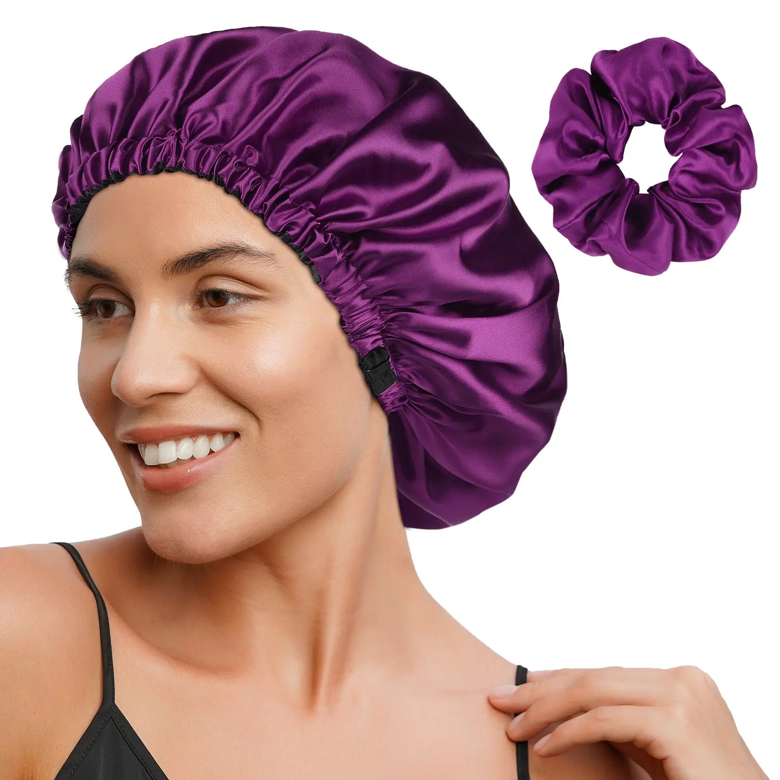 Woman wearing a purple reversible satin bonnet with matching scrunchie for hair protection