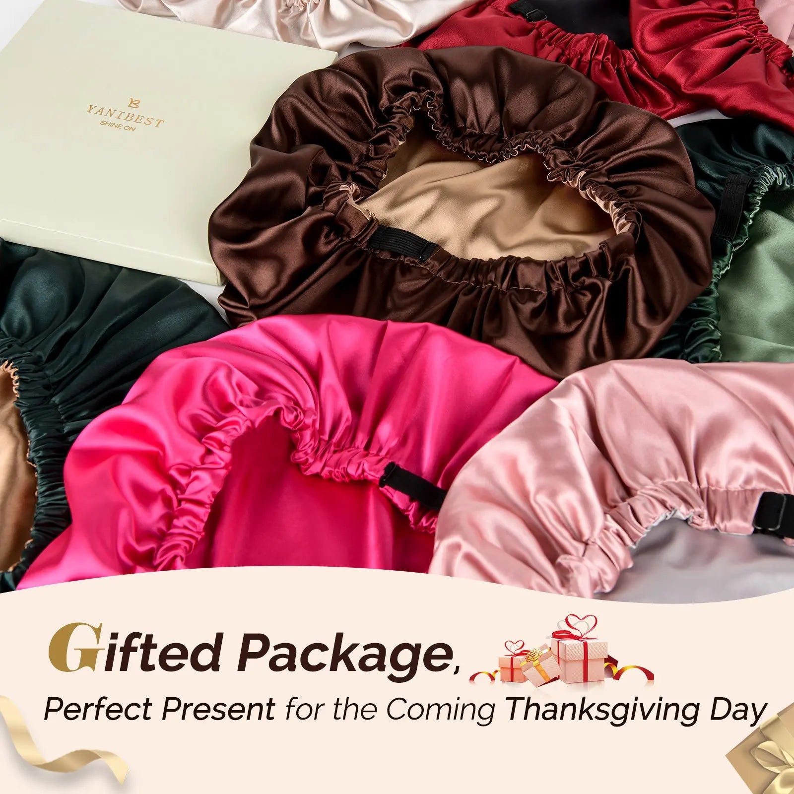 Assorted reversible satin bonnets in various colors arranged near a gift box, perfect for hair care gifts.