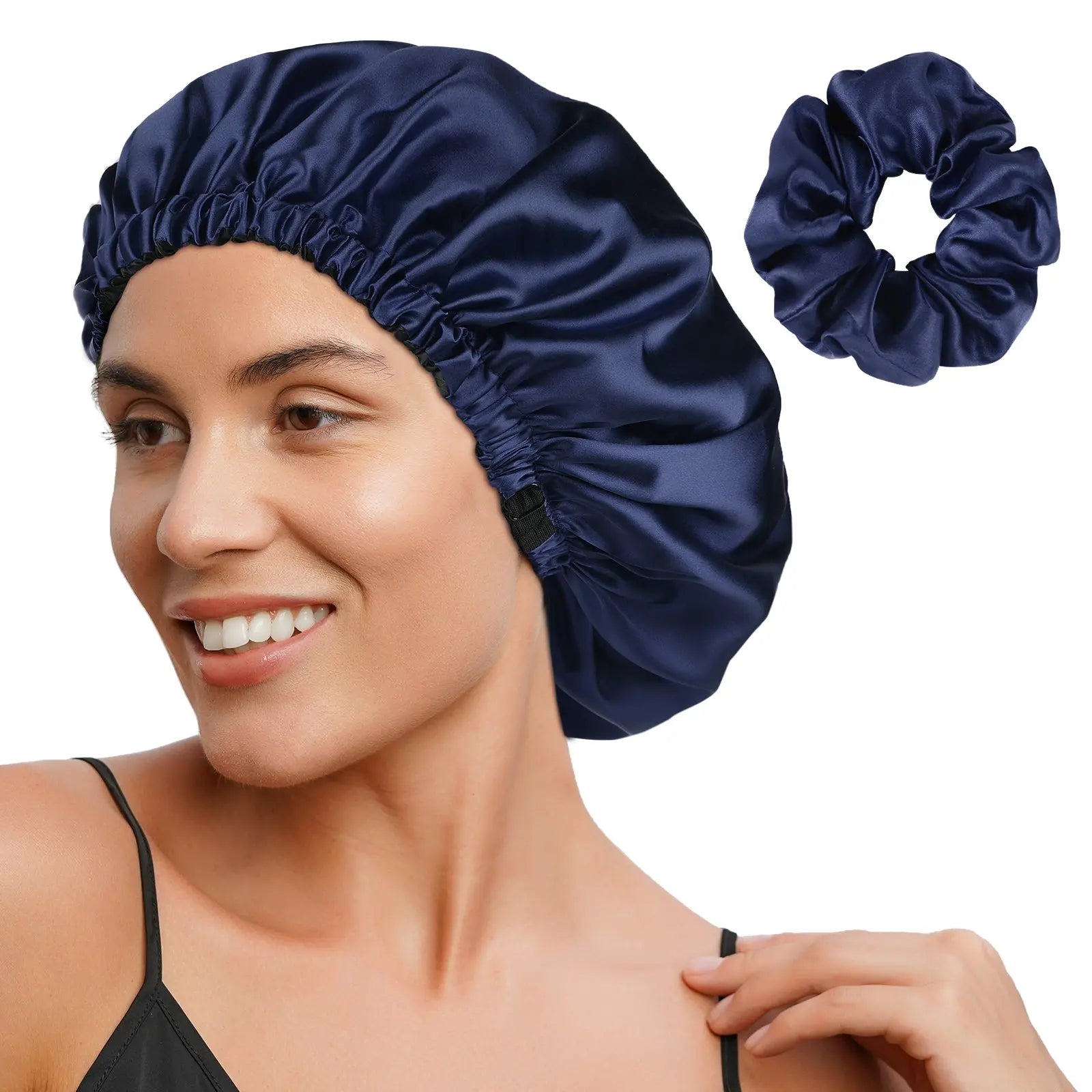 Woman wearing midnight blue satin reversible hair bonnet with matching scrunchie