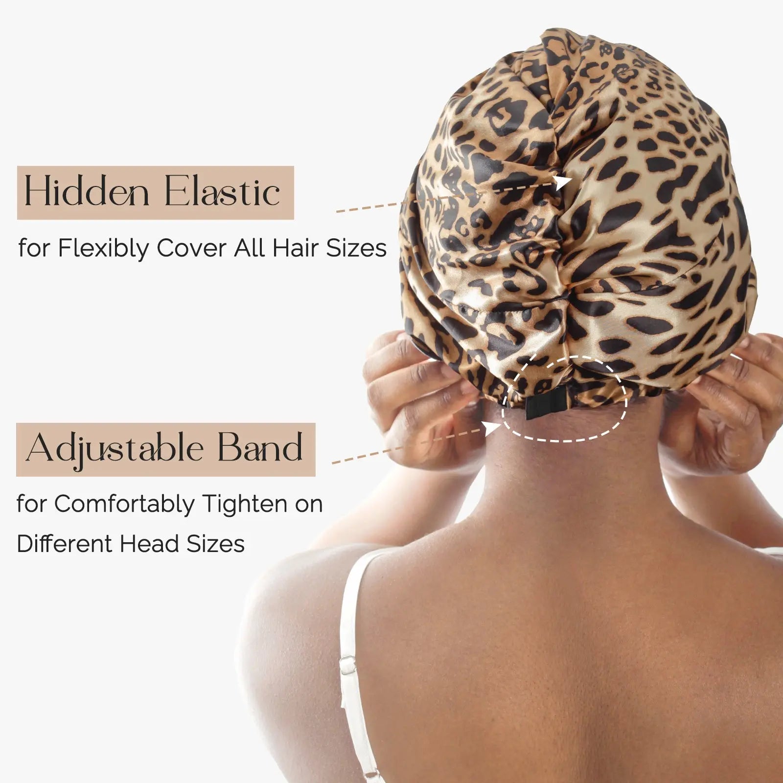 Woman wearing a leopard print satin knotted turban with adjustable band and hidden elastic.