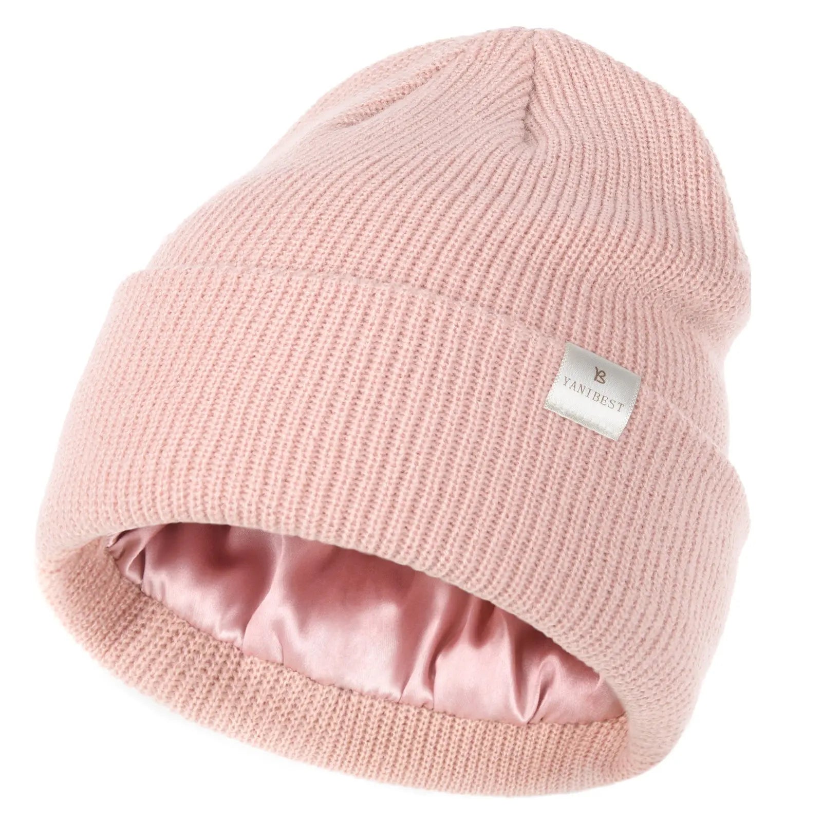 Rose pink satin-lined beanie hat, unisex, soft knit with visible YANIBEST tag and shiny interior.