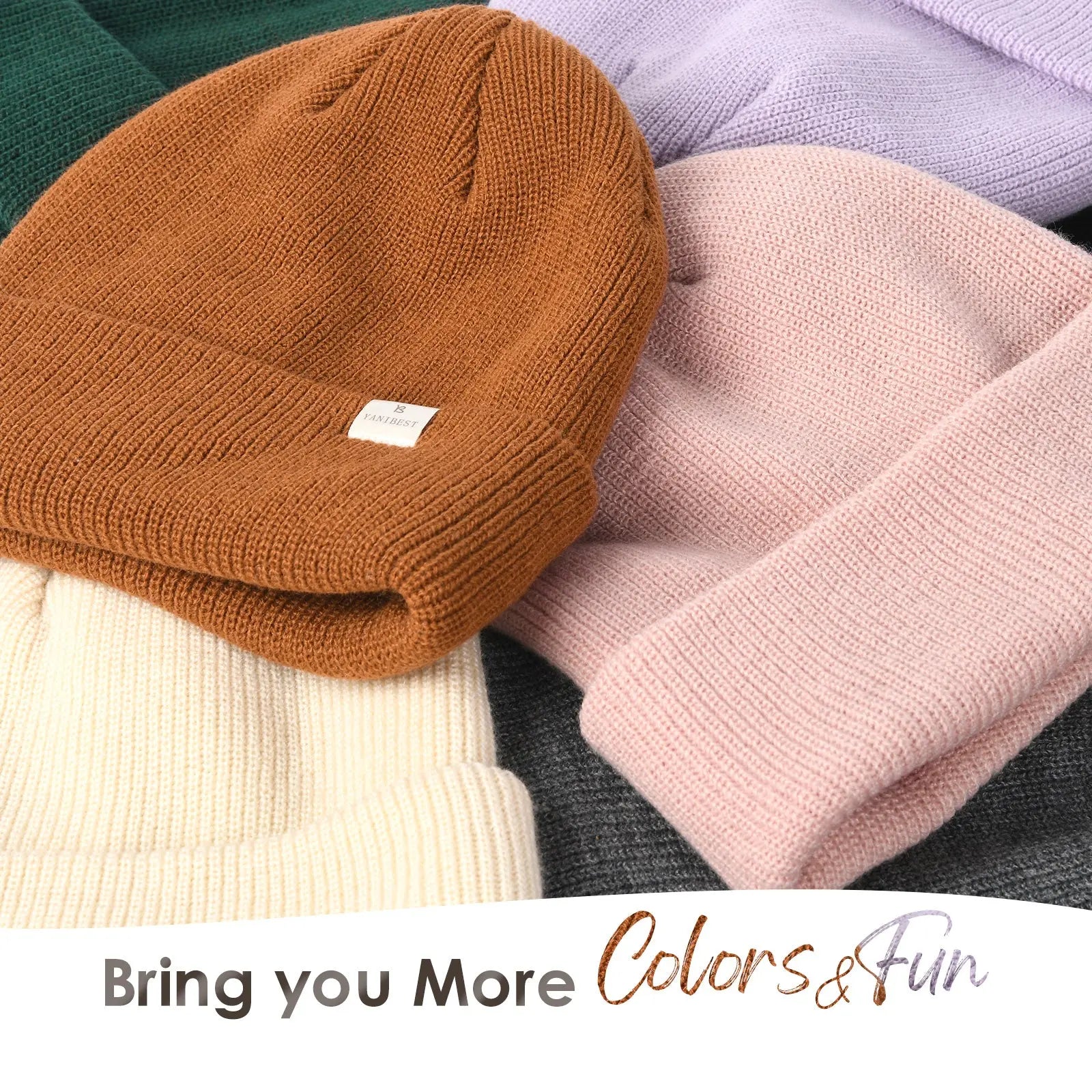 Assorted satin-lined cuffed beanie hats in various colors, close-up for winter fashion.