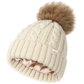 Cream cable knit winter beanie with satin lining and faux fur pom pom on top