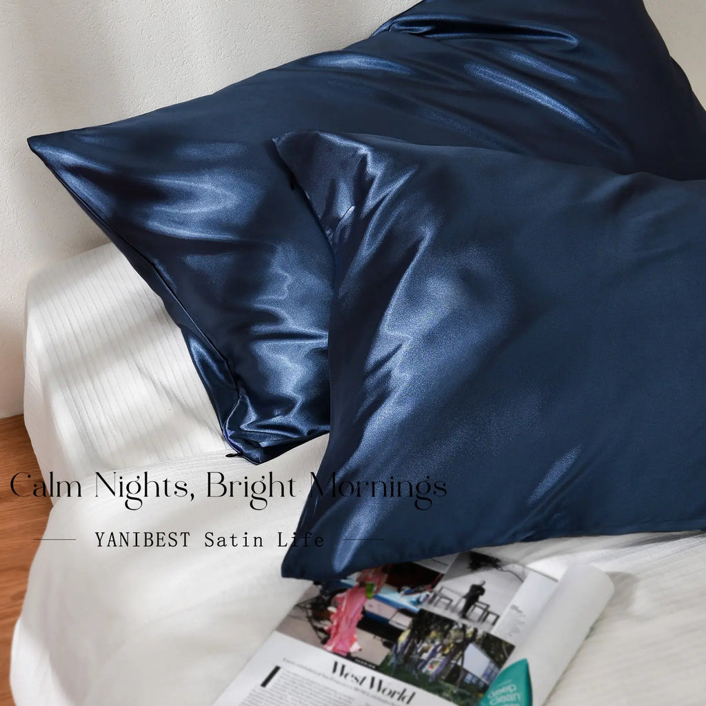 Ocean blue satin pillowcases set on a white bed, smooth and shiny texture, bedroom decor