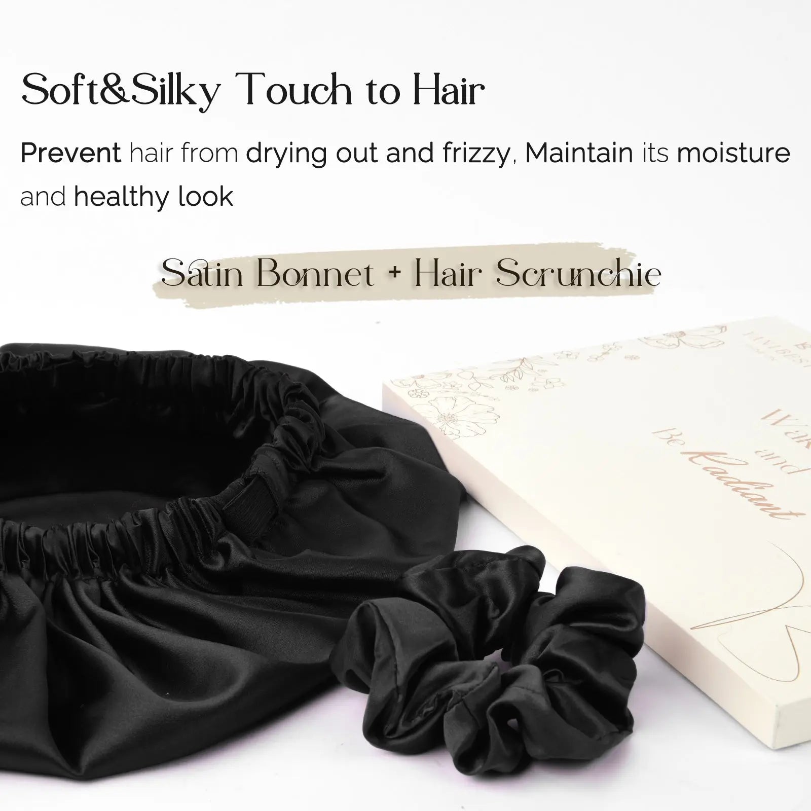 Black satin bonnet and matching scrunchie set for hair protection, displayed on white background